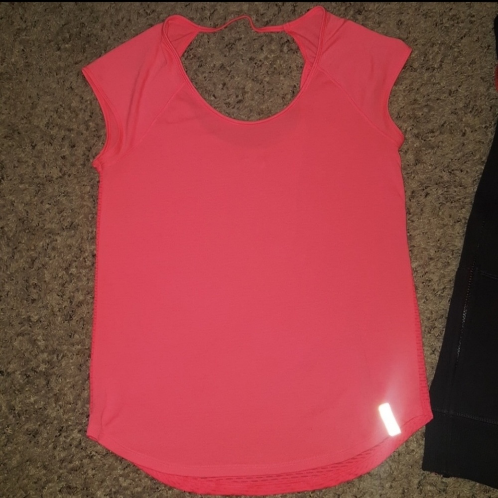 Under Armour coral colored shirt